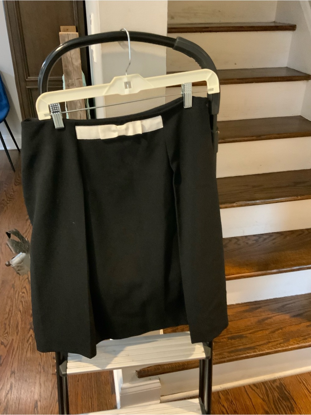 Elegant Black Midi Skirt with Cream Bow Accent